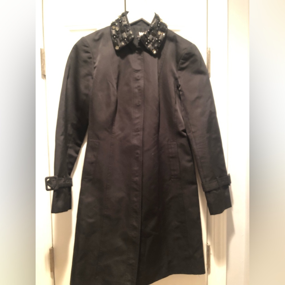 Fabulous  3/4 length dress coat with adjustable wrist straps and jewel collar.